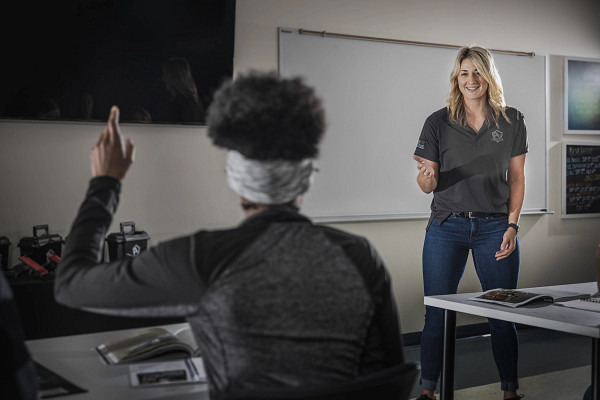 woman teaching another woman